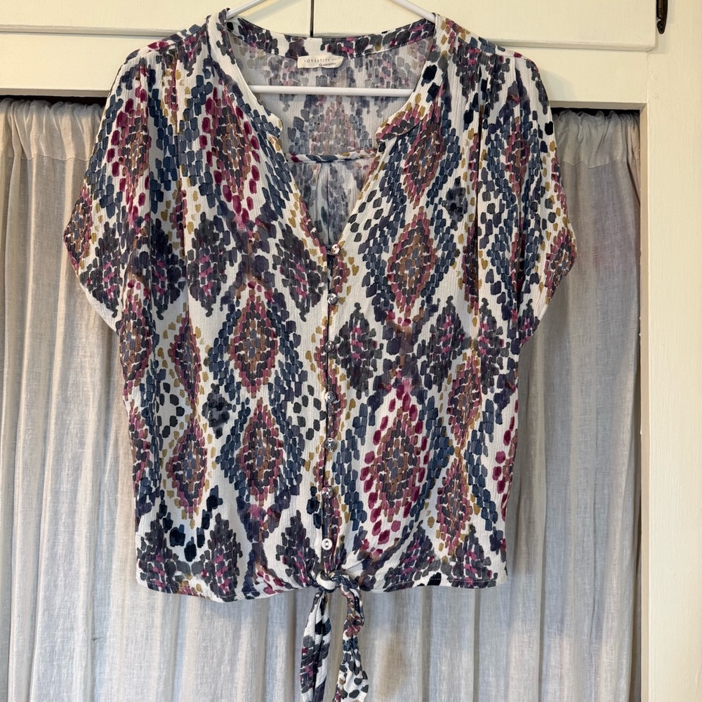 Lovestitch tie-front top with buttons.